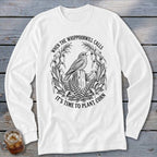 A white long-sleeve t-shirt with a black line art graphic of a bird, cornstalks, and text.