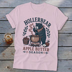 Bear stirring pot of apple butter with "Hollerbear Apple Butter Season" text.