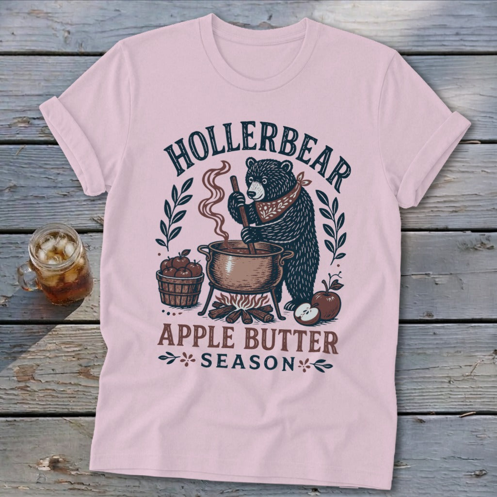 Bear stirring pot of apple butter with "Hollerbear Apple Butter Season" text.