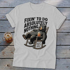 Light gray t-shirt with a graphic of a relaxed bear in a rocking chair and text.