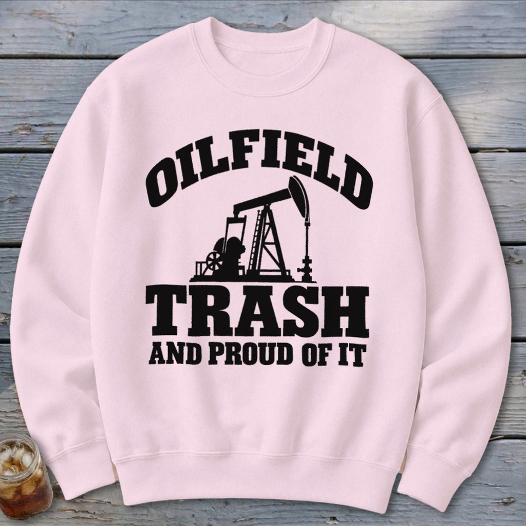 Light pink sweatshirt with "OILFIELD TRASH AND PROUD OF IT" and oil pump graphic.