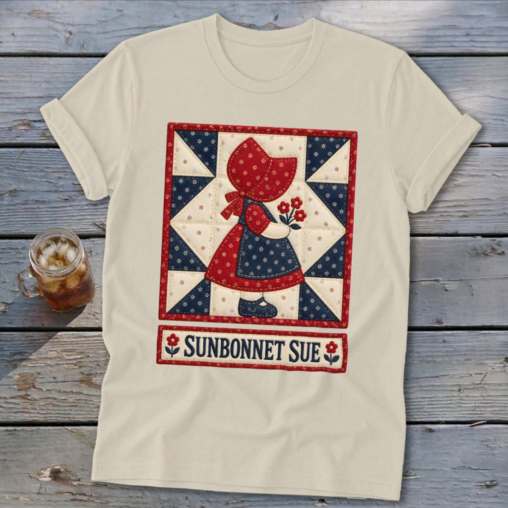 Cream t-shirt with Sunbonnet Sue quilt design and text.