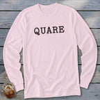 Pink long-sleeve t-shirt with black text "QUARE" and a glass of iced drink.