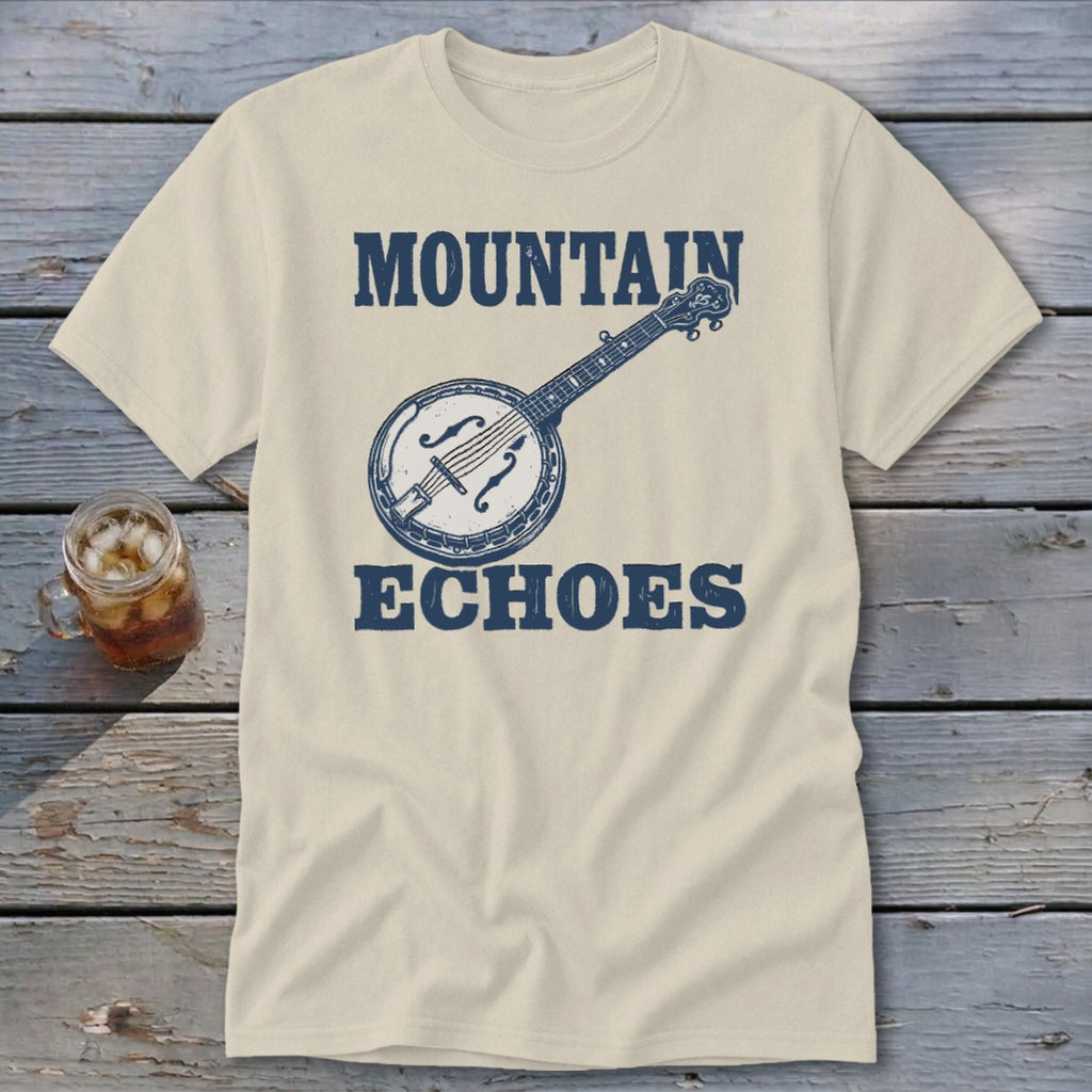 A light cream t-shirt with a blue graphic of a banjo and the text Mountain Echoes.