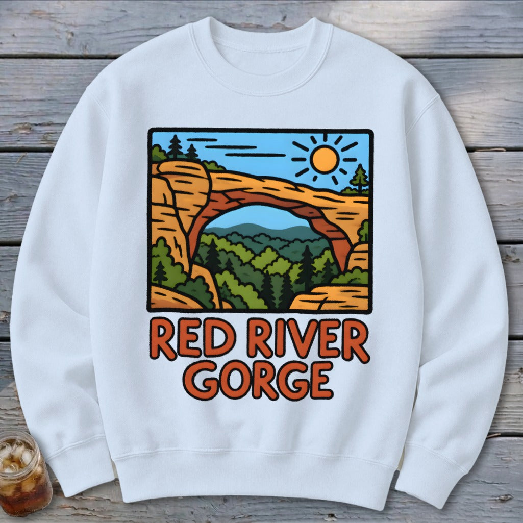 White sweatshirt with Red River Gorge graphic featuring a natural arch and forest.