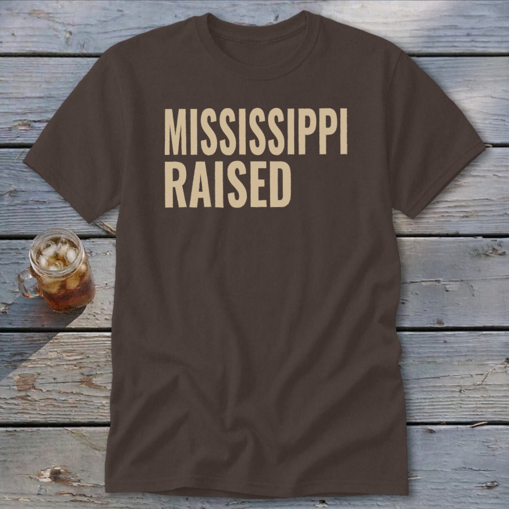 Brown t-shirt with "MISSISSIPPI RAISED" text in beige.