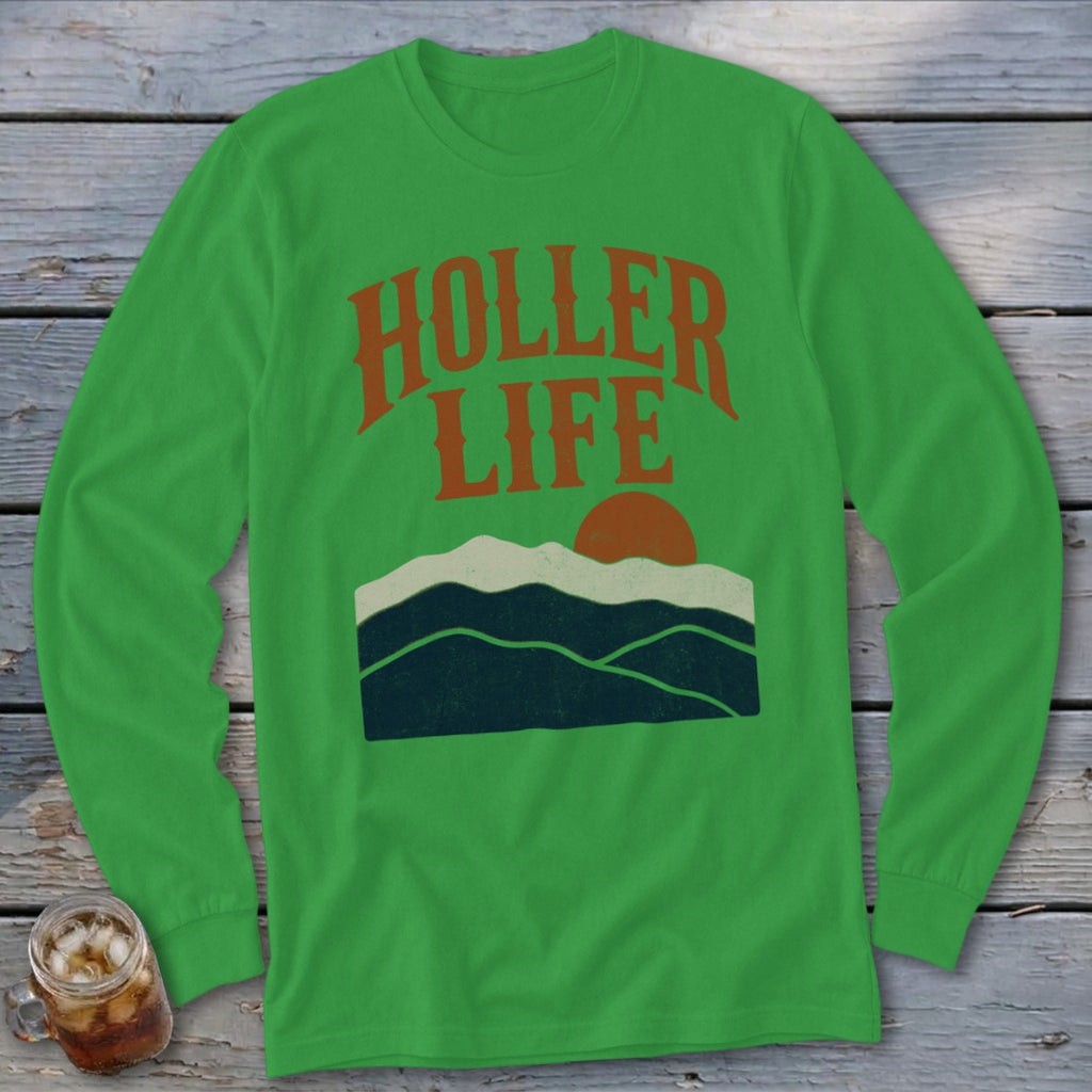 Bright green long-sleeve t-shirt with orange text reading HOLLER LIFE above a mountain landscape graphic.
