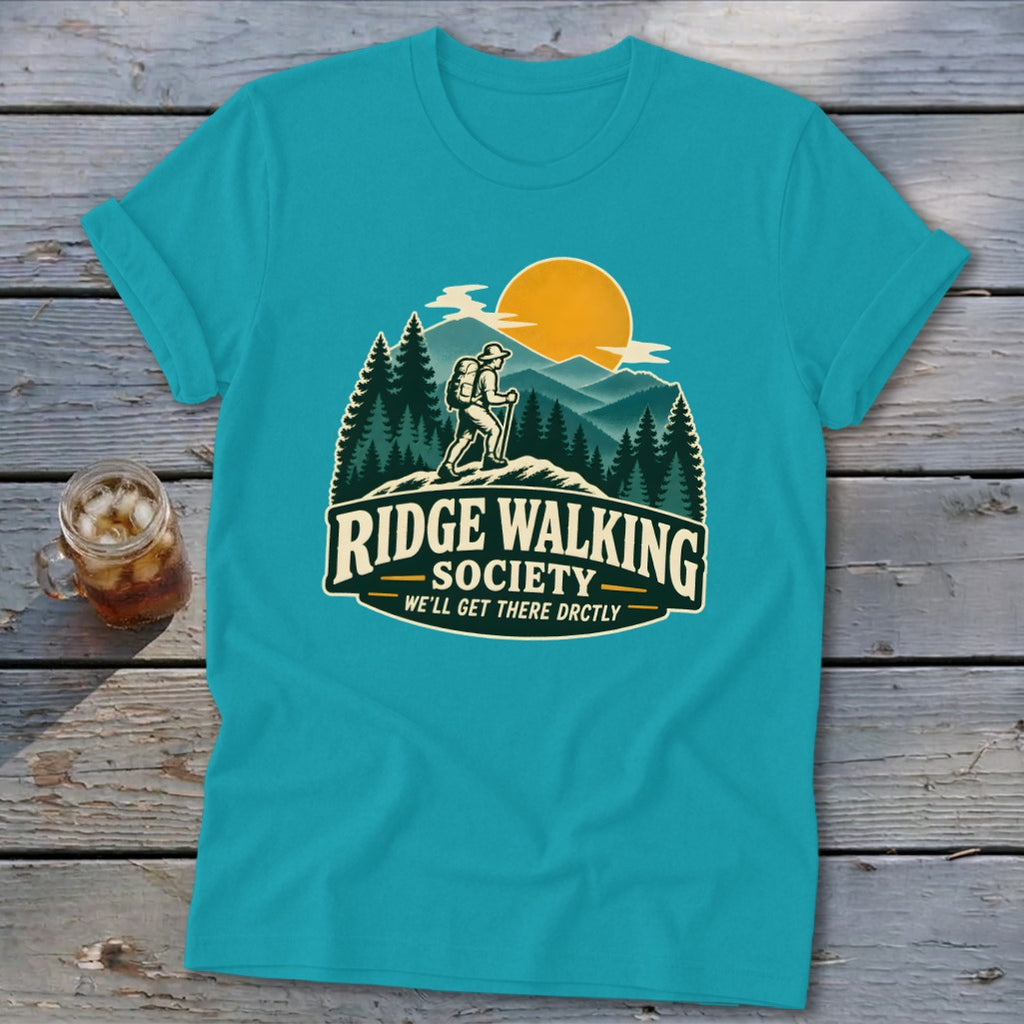 T-shirt graphic: hiker on ridge, mountains, sun, trees, "Ridge Walking Society" text.