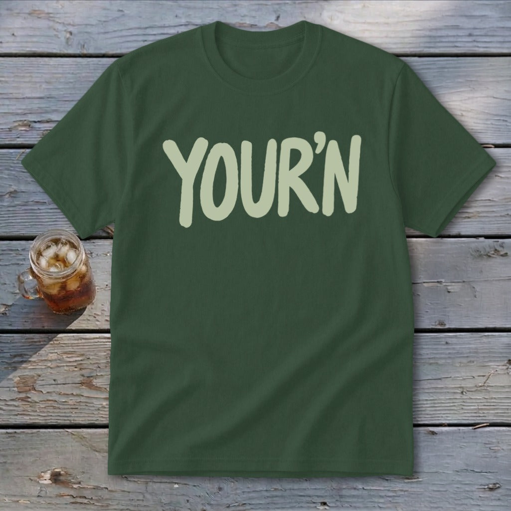 Dark green t-shirt with "YOUR'N" printed in light green text.