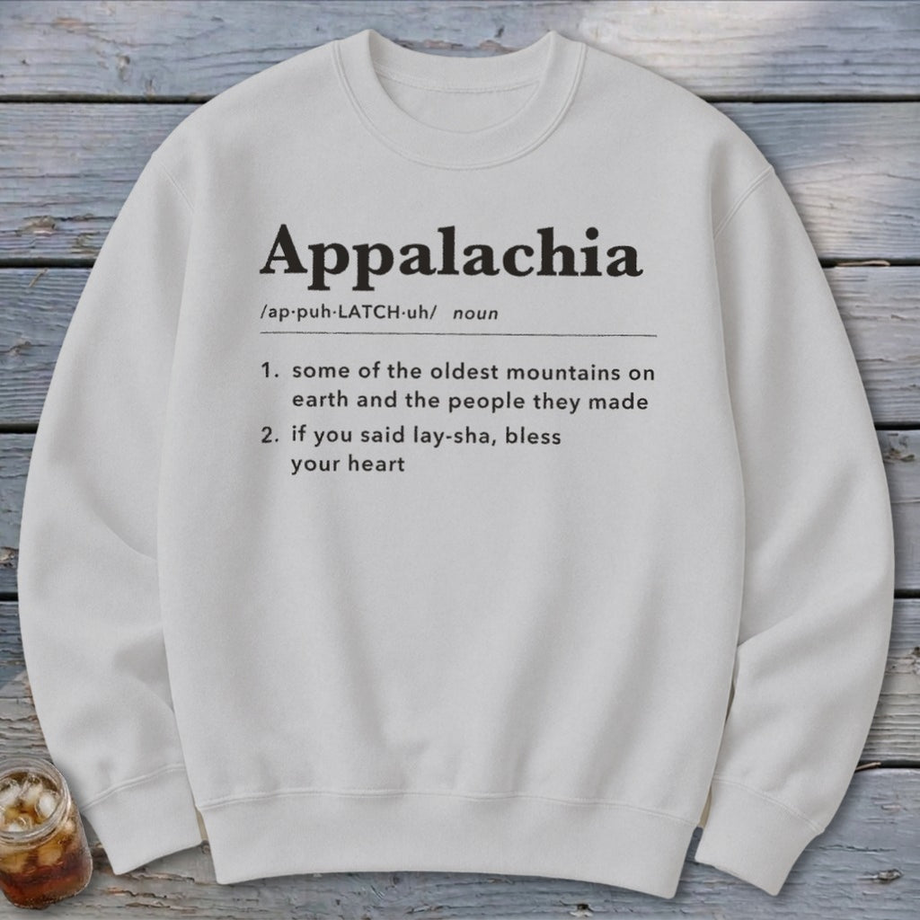 A white crewneck sweatshirt printed with a humorous dictionary-style definition of Appalachia in black text.