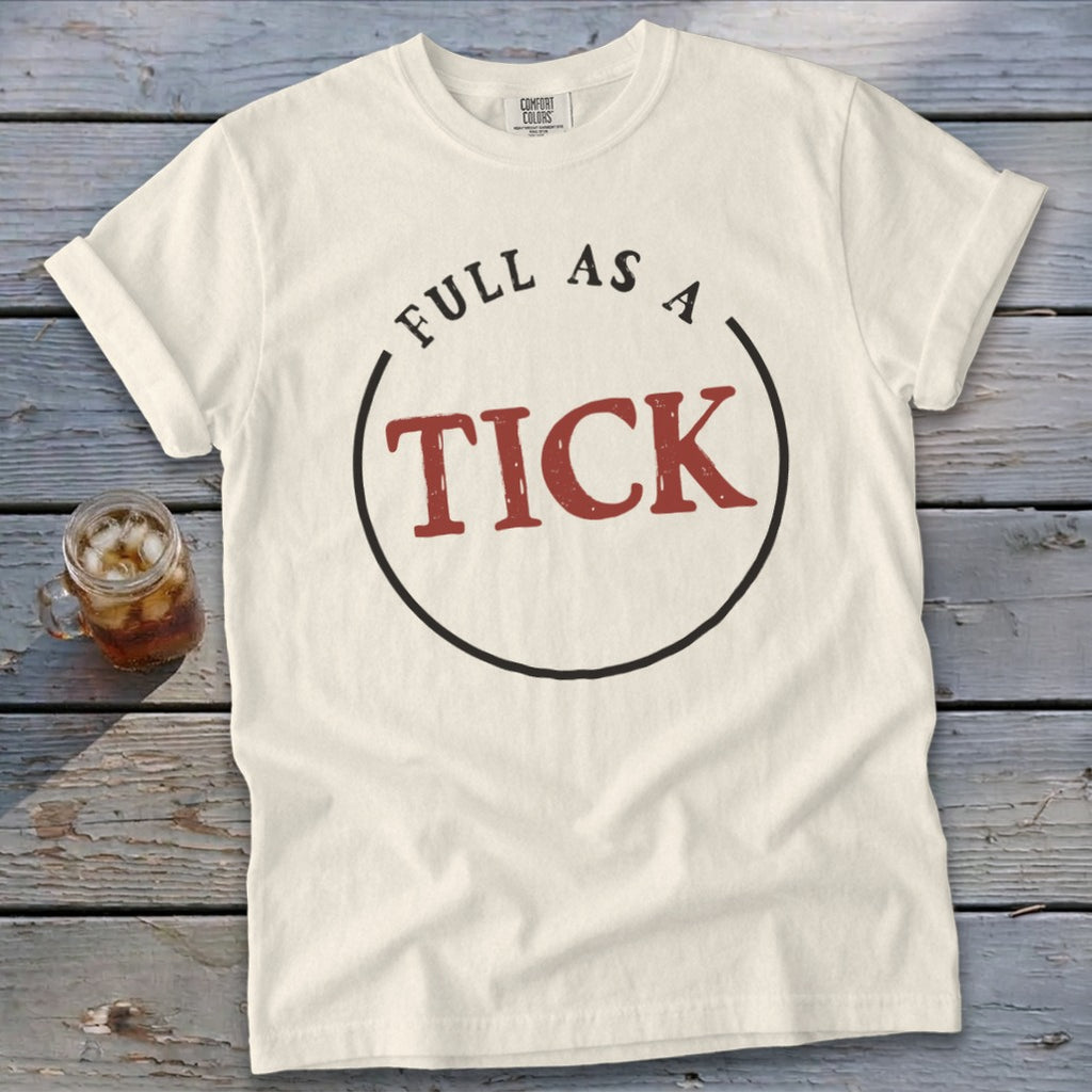 Cream t-shirt with "FULL AS A TICK" text inside a circle graphic.