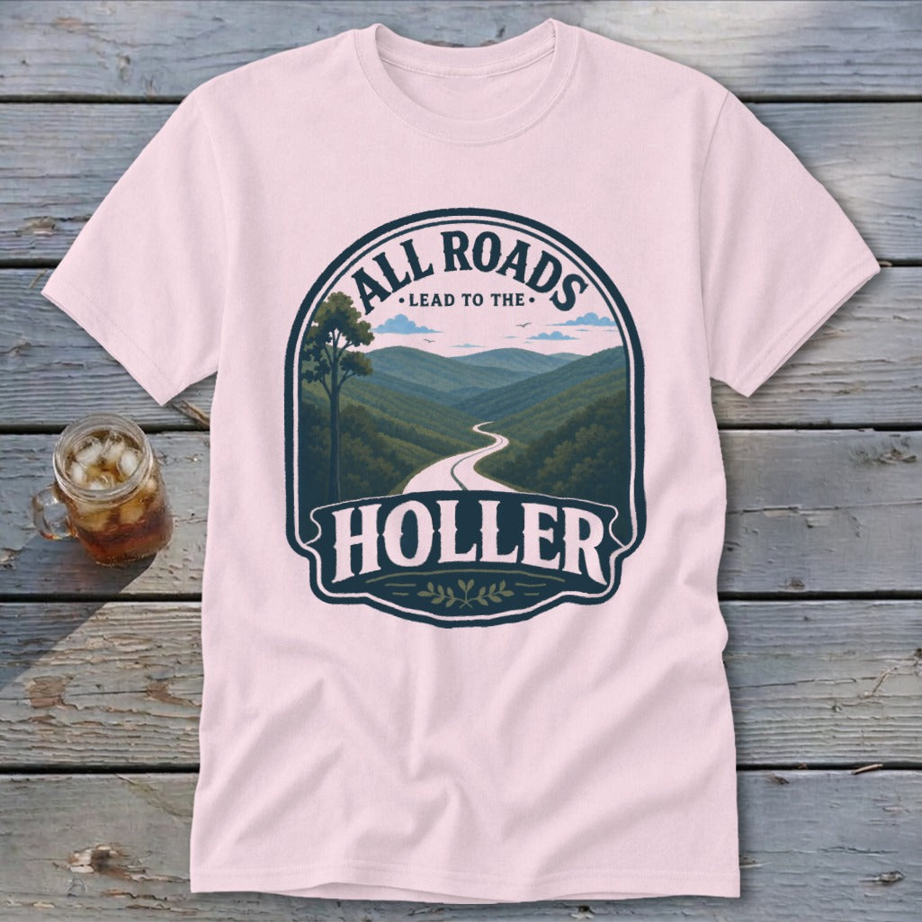 Pink t-shirt with graphic "All Roads Lead to the Holler" and mountain landscape.