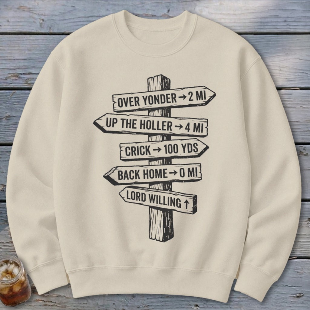 Beige crewneck sweatshirt featuring a black graphic of a wooden signpost with rustic directional distances.