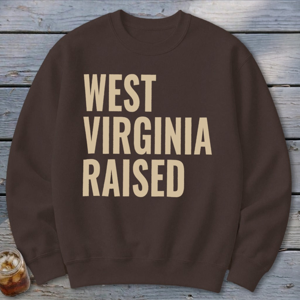 Brown sweatshirt with "WEST VIRGINIA RAISED" in cream text.