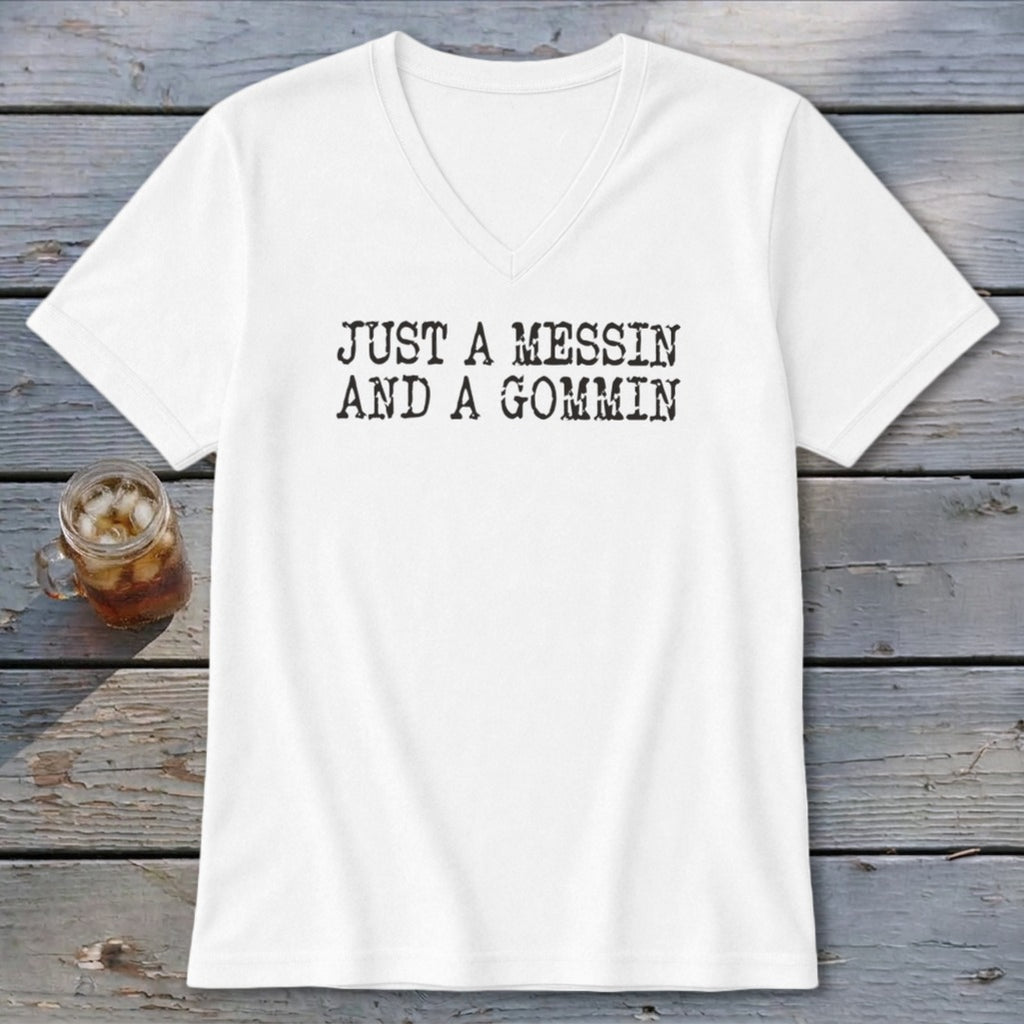 White v-neck t-shirt with black text "JUST A MESSIN AND A GOMMIN".