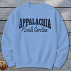 Light blue crewneck sweatshirt with "APPALACHIA #South Carolina" graphic.