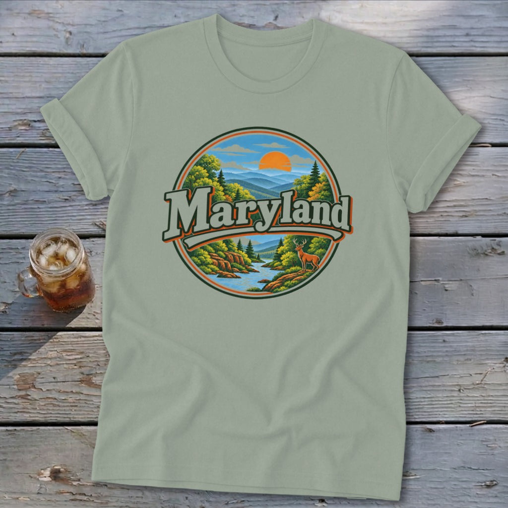 Green t-shirt with circular Maryland landscape graphic featuring deer and mountains.