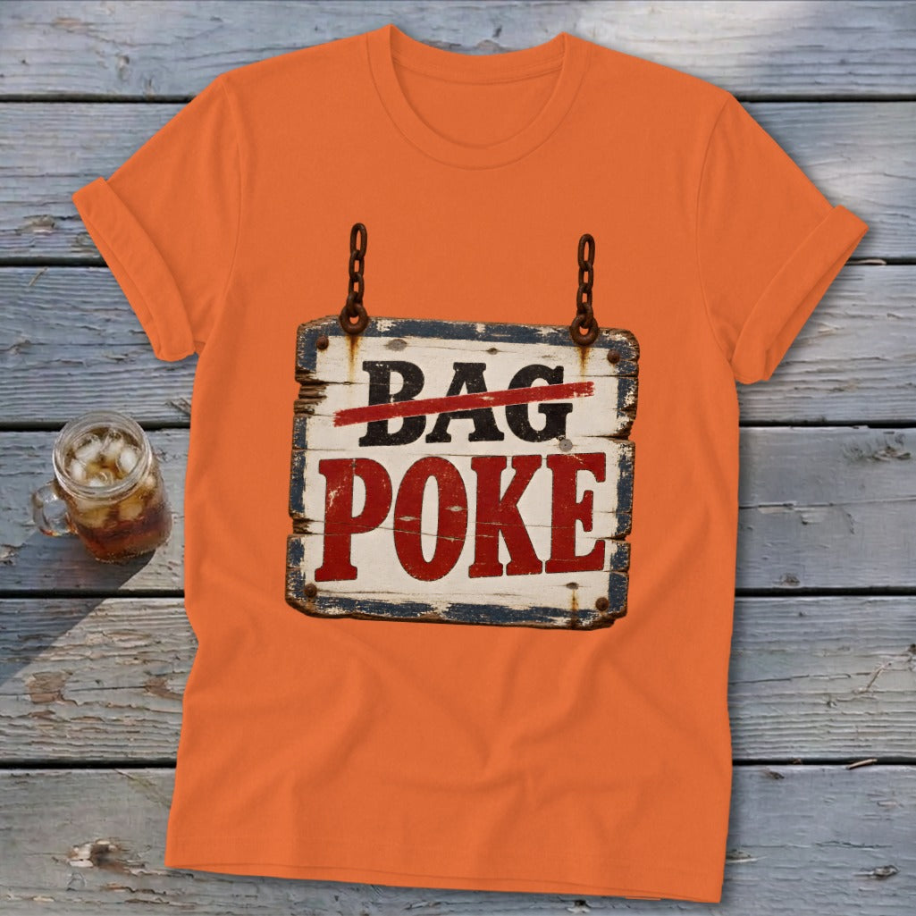 An orange t-shirt featuring a hanging sign graphic that reads BAG POKE on a wooden background.