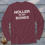 Maroon long-sleeve shirt with white text "HOLLER IN MY BONES"