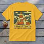 Gold t-shirt featuring a graphic of stacked pumpkins, hills, and the text Harvest Days in the Highlands.