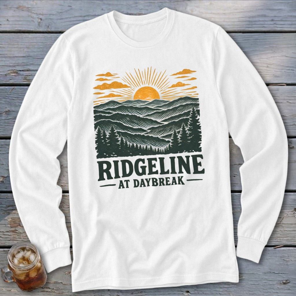 White long sleeve shirt with "RIDGELINE AT DAYBREAK" text and mountain sunset graphic.