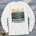 White long sleeve shirt with "RIDGELINE AT DAYBREAK" text and mountain sunset graphic.