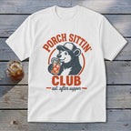 White t-shirt with "Porch Sittin' Club" text and a bear drinking from a jar.