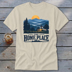 Beige t-shirt with a landscape scene and text that says "The Home Place".