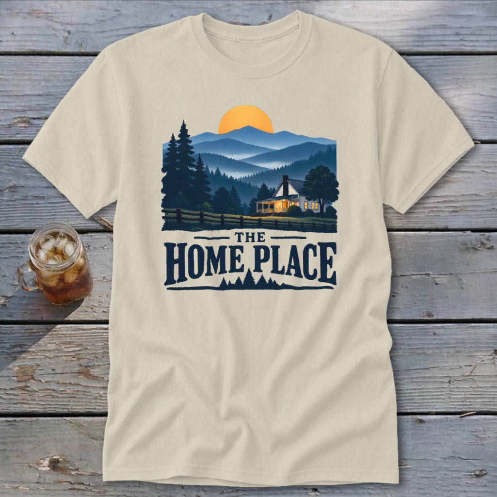 Beige t-shirt with a landscape scene and text that says "The Home Place".