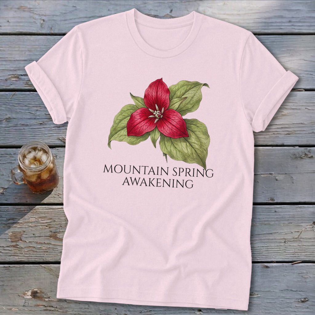 Pink t-shirt with a red trillium flower and "MOUNTAIN SPRING AWAKENING" text.