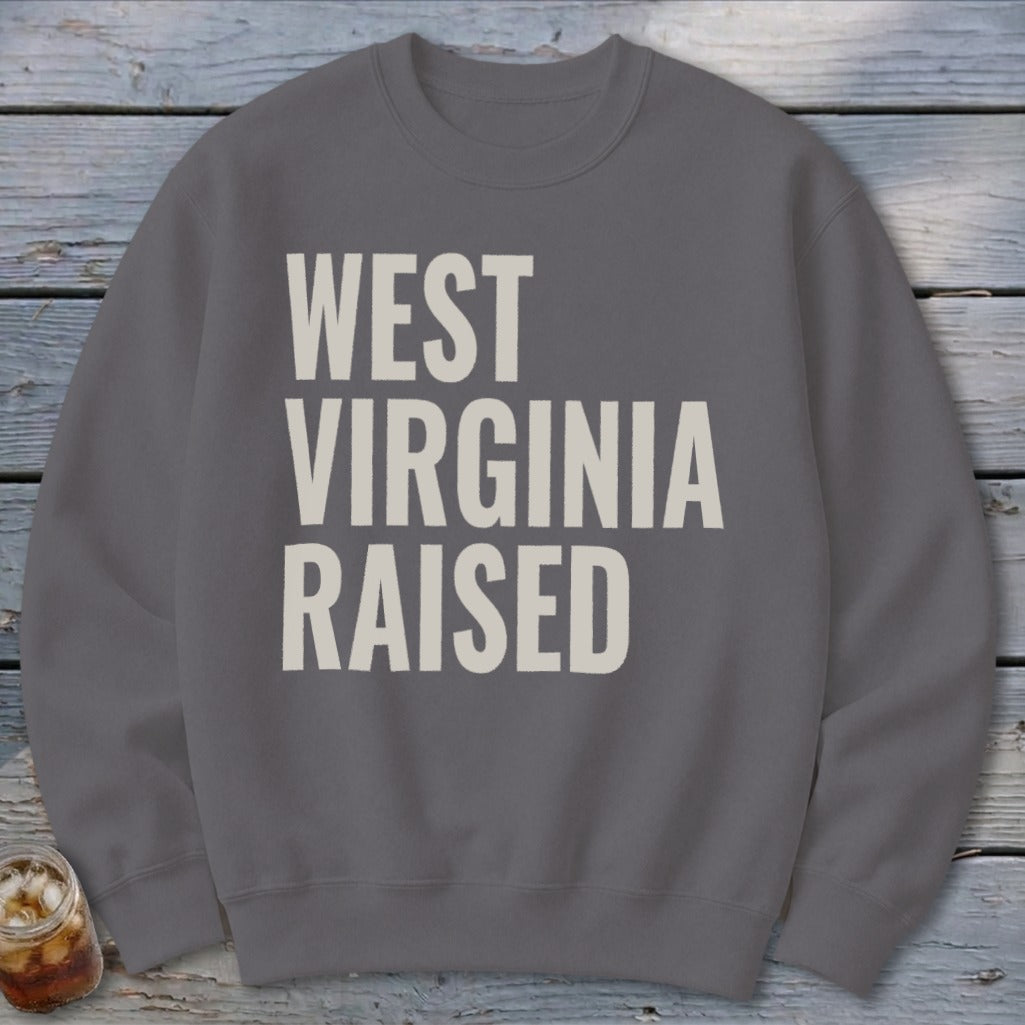 Gray sweatshirt with "WEST VIRGINIA RAISED" text in cream.
