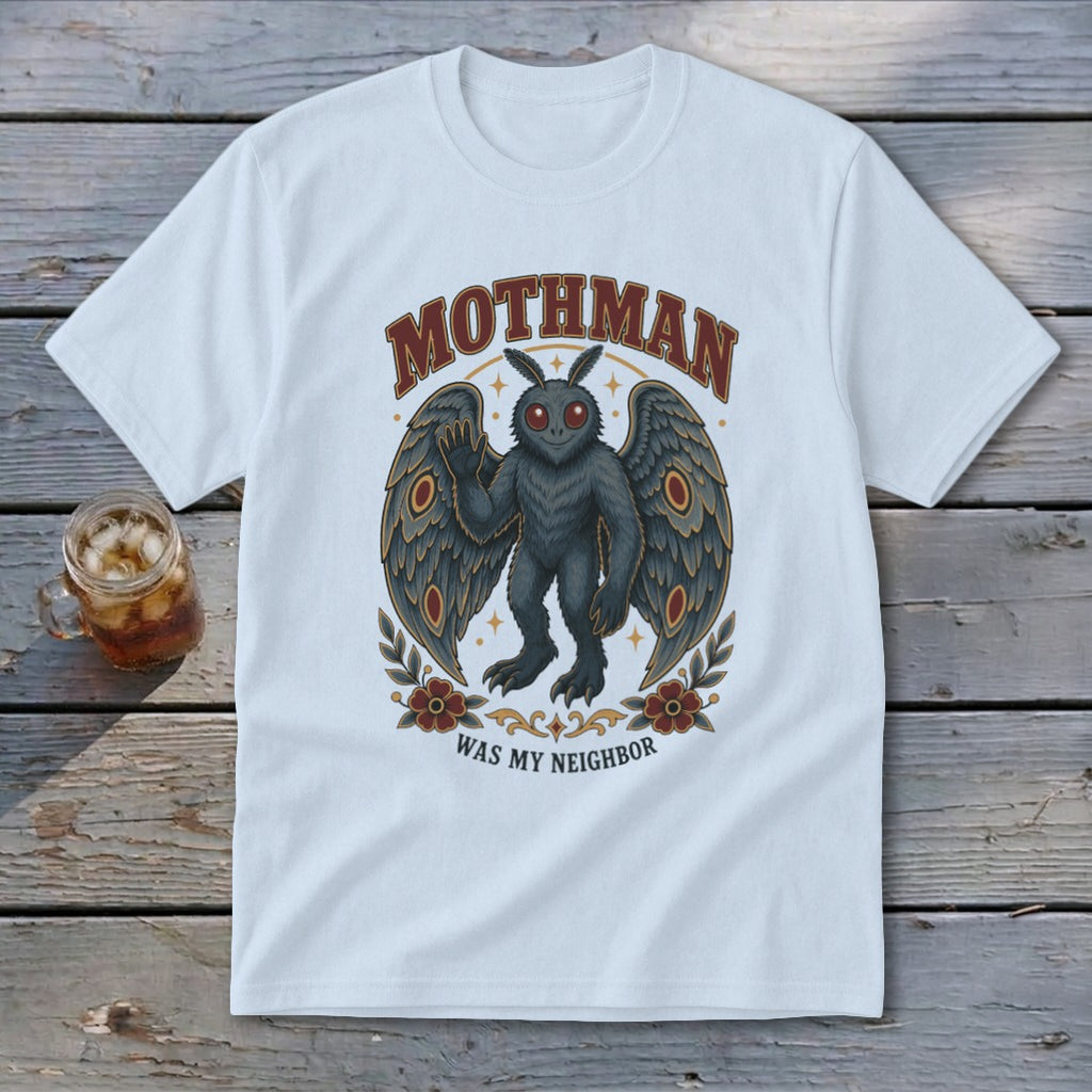 White t-shirt featuring Mothman graphic with text "Mothman Was My Neighbor".