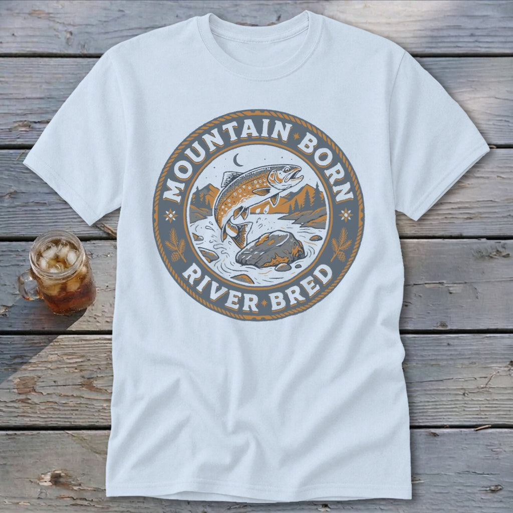 Light blue t-shirt with a circular graphic of a jumping trout and text "Mountain Born River Bred".