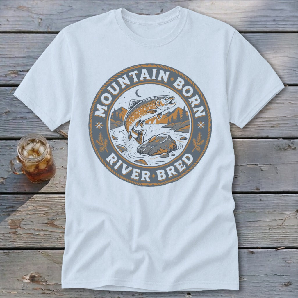 Light blue t-shirt with a circular graphic of a jumping trout and text "Mountain Born River Bred".