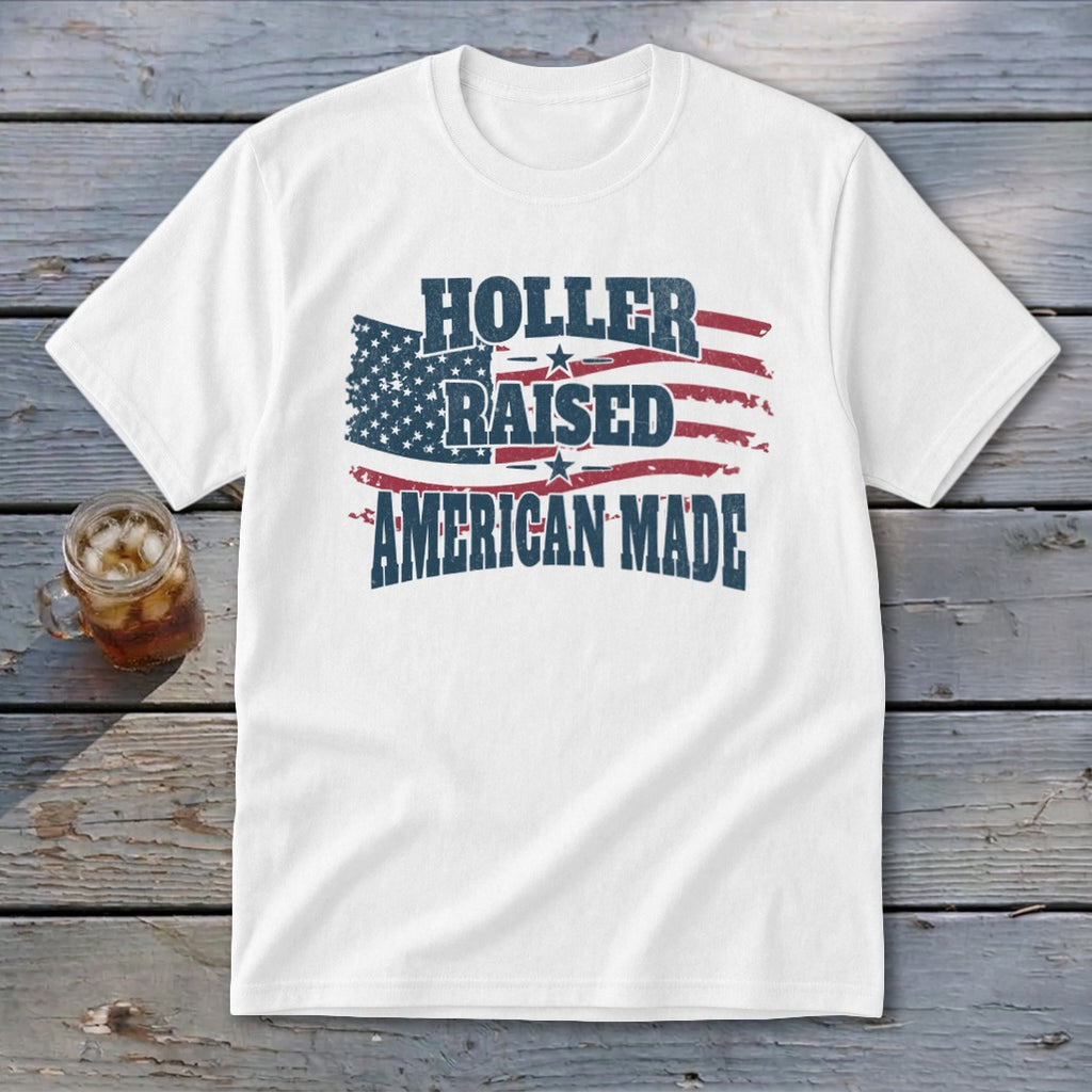 White t-shirt with distressed American flag graphic and text "HOLLER RAISED AMERICAN MADE".