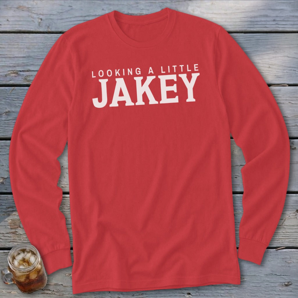 Red long sleeve shirt with "LOOKING A LITTLE JAKEY" text.