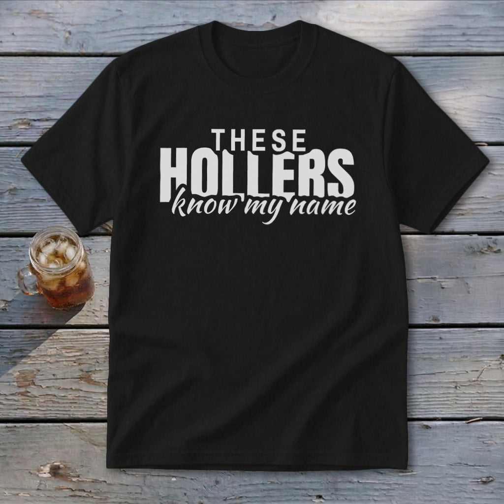 Black t-shirt with white text reading "THESE HOLLERS know my name".