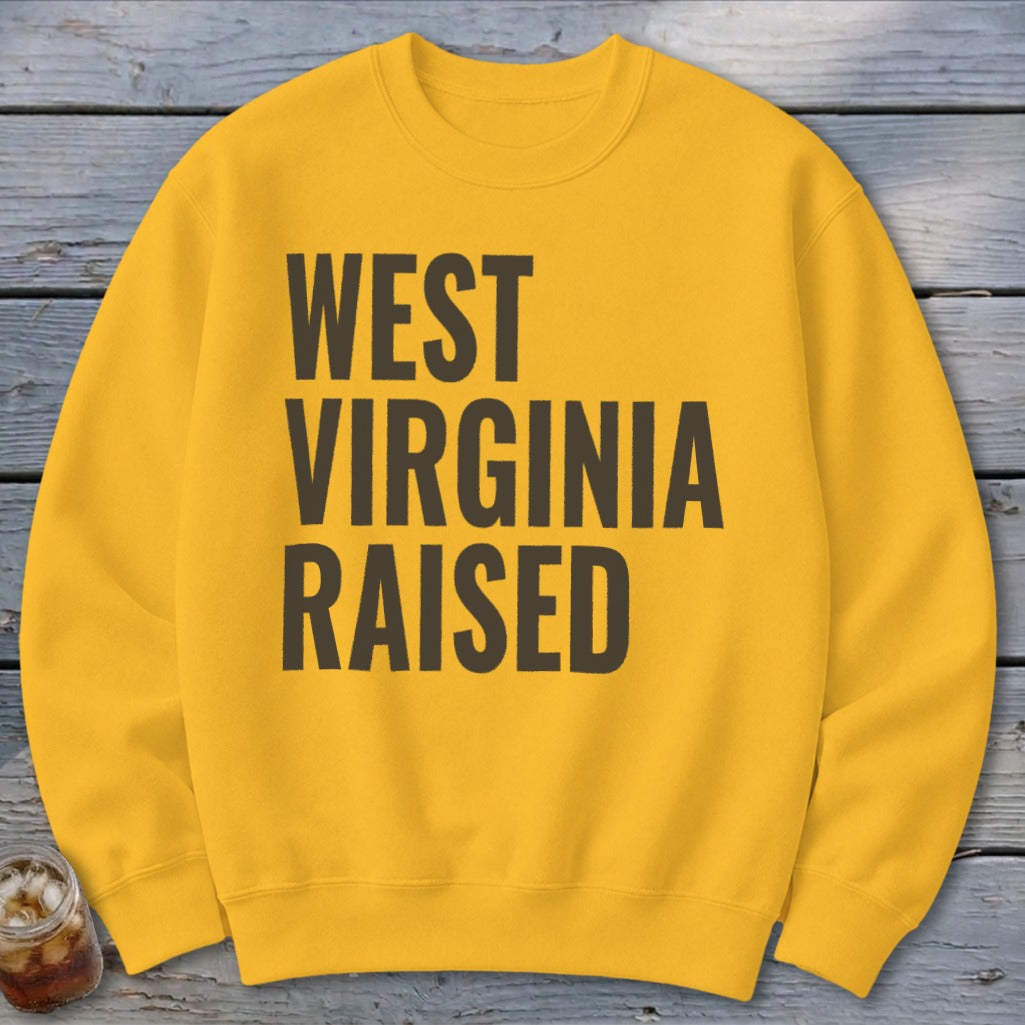 Yellow sweatshirt with "WEST VIRGINIA RAISED" text in dark gray.