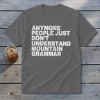 Grey t-shirt with white text reading "Anymore people just don't understand mountain grammar".