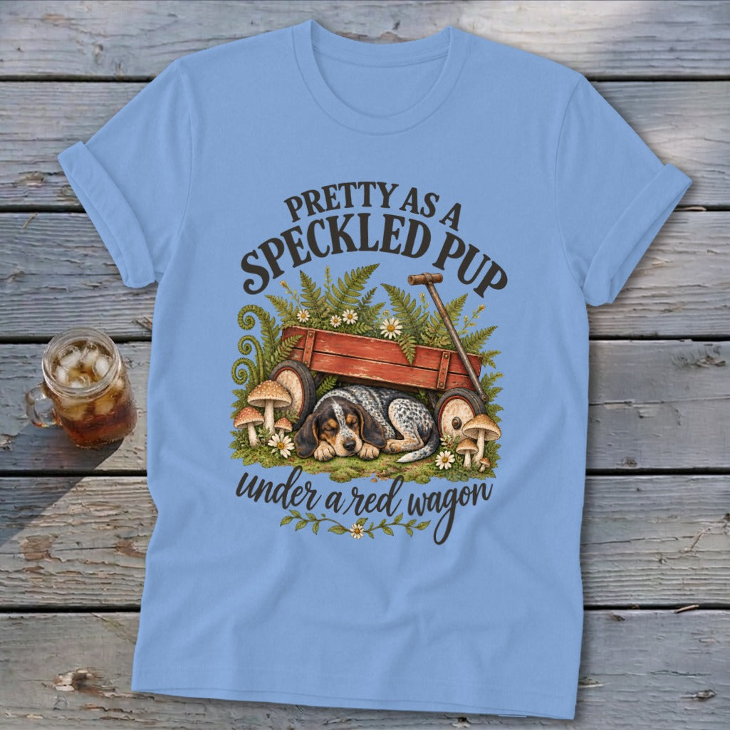 Light blue t-shirt with illustration "Pretty as a Speckled Pup Under a Red Wagon".