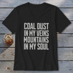 A black V-neck t-shirt with the text Coal Dust in My Veins Mountains in My Soul.