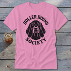 Pink t-shirt with black "Holler Hound Society" text and dog graphic.
