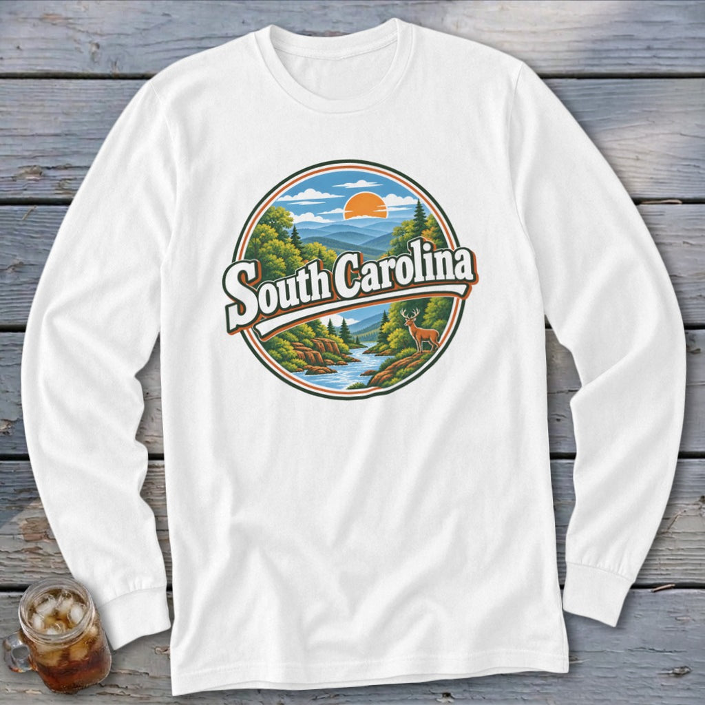 White long-sleeve shirt with circular "South Carolina" scenic graphic featuring mountains, river, and deer.