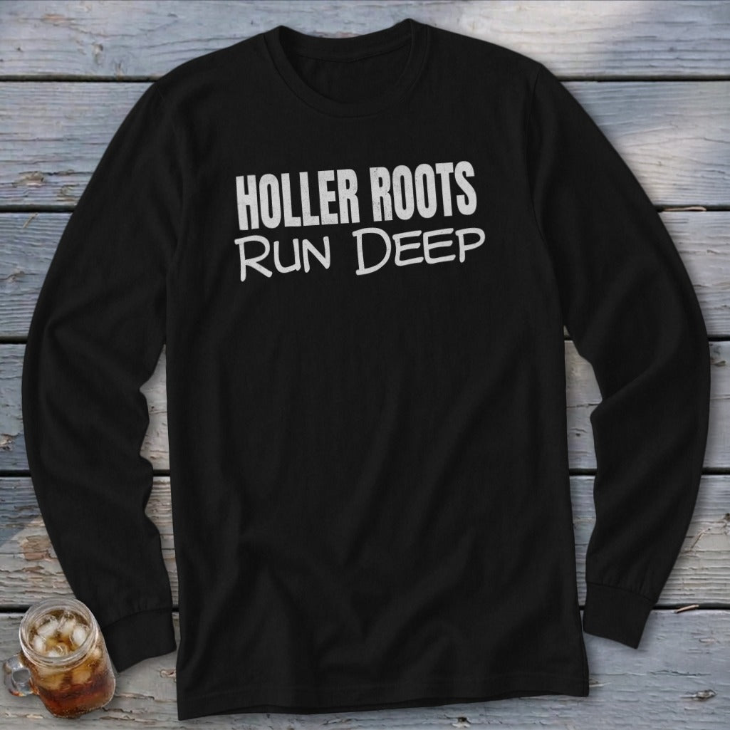 Black long-sleeve shirt with white text "HOLLER ROOTS RUN DEEP".