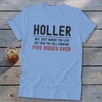 Light blue t-shirt with black text that reads "HOLLER NOT JUST WHERE YOU LIVE BUT HOW YOU CALL SOMEONE FIVE RIDGES OVER".