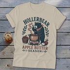 T-shirt with bear making apple butter, text "HOLLERBEAR APPLE BUTTER SEASON".
