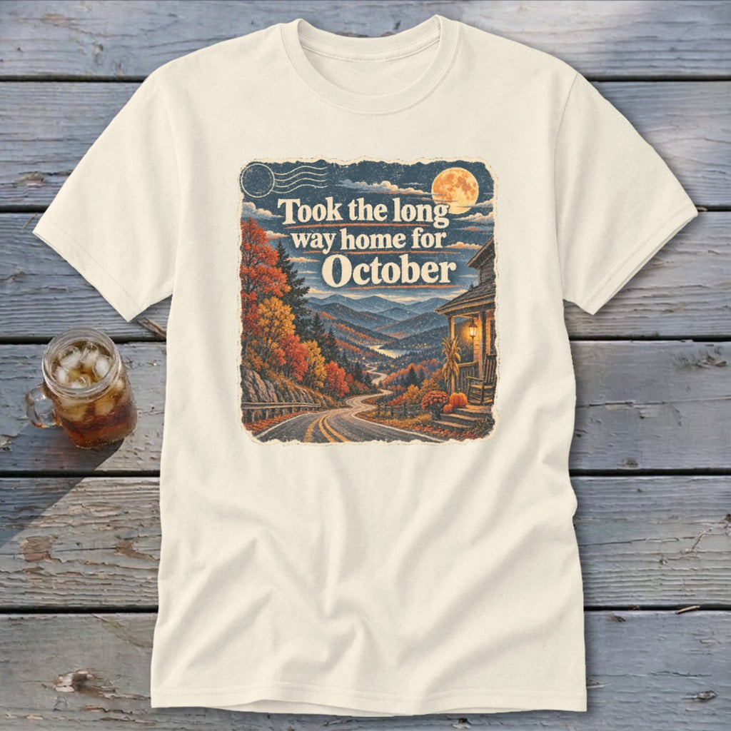 Cream t-shirt with text "Took the long way home for October" and autumn mountain scene.