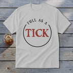 White t-shirt with text "FULL AS A TICK" inside a black circle.