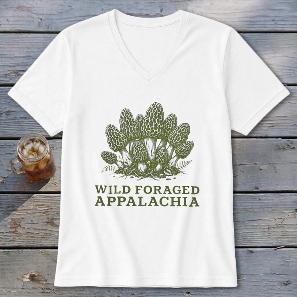 White v-neck t-shirt with green illustration of morel mushrooms and "Wild Foraged Appalachia" text.