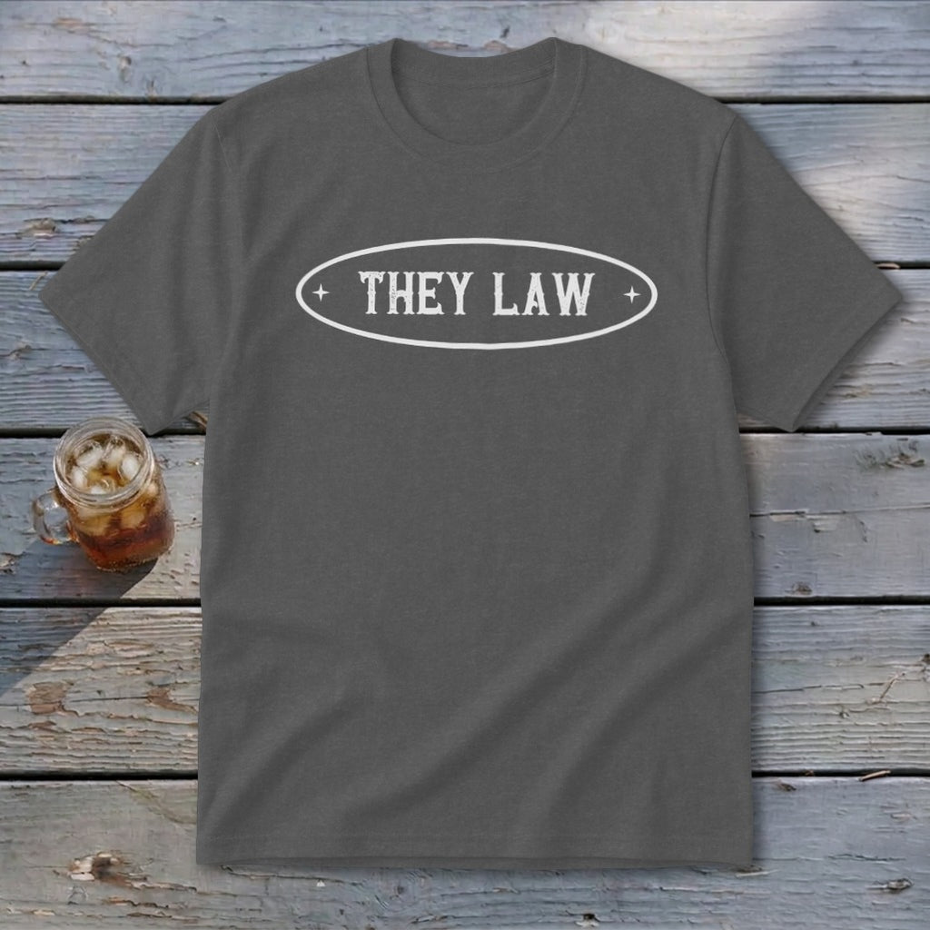 Grey t-shirt with "THEY LAW" text inside a white oval emblem.